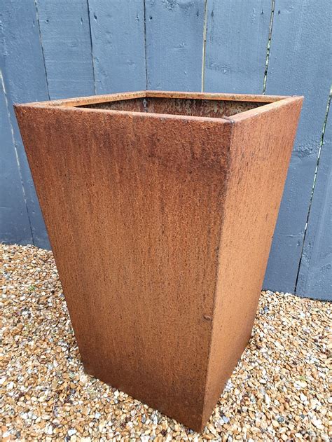 rusty metal tall planter box|rust sprinkler not working.